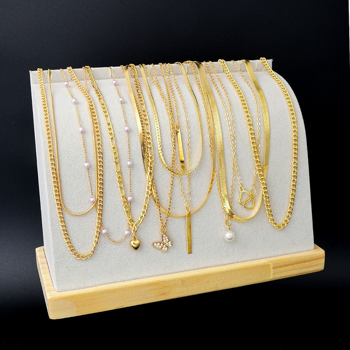 Ensemble de colliers fantaisie multicouches pour femme, style européen et américain, avec chaînes géométriques originales, chaîne en alliage et pendentif cœur allongé.