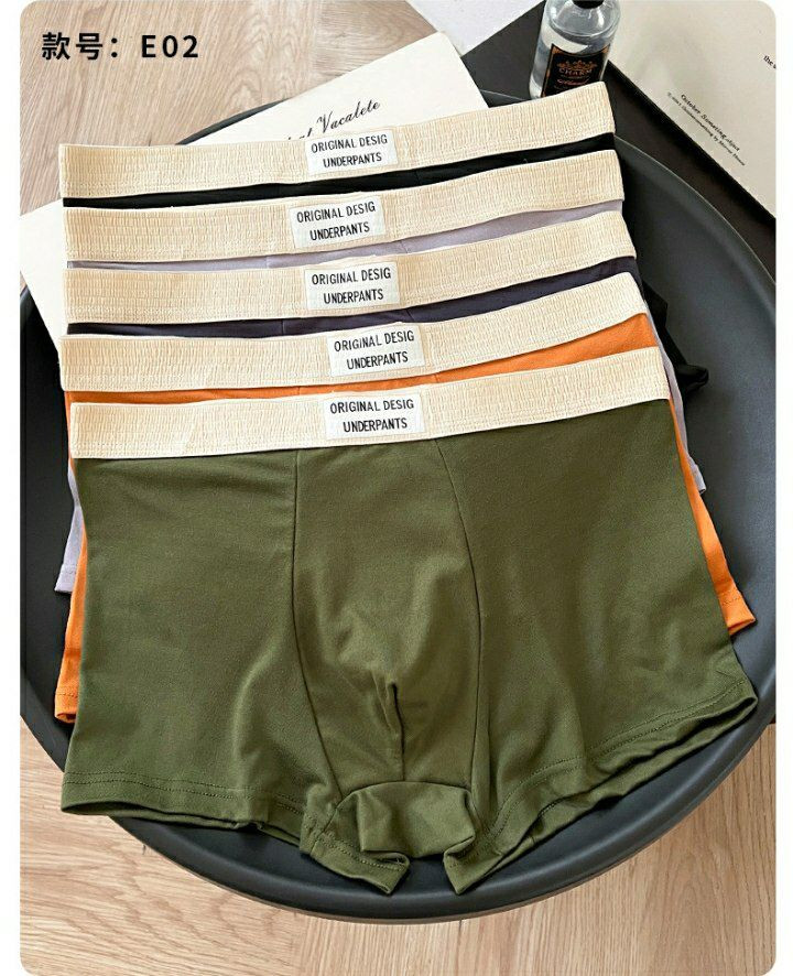 Boxer pour hommes Boxer pour hommes lettre ample taille moyenne respirant sans couture Boxer pour garçons vente en gros